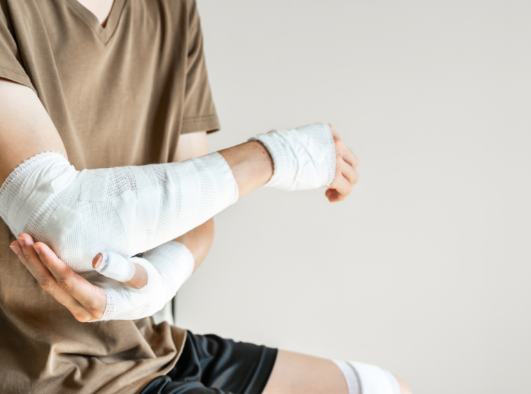 injured person wrapped arms in gauze