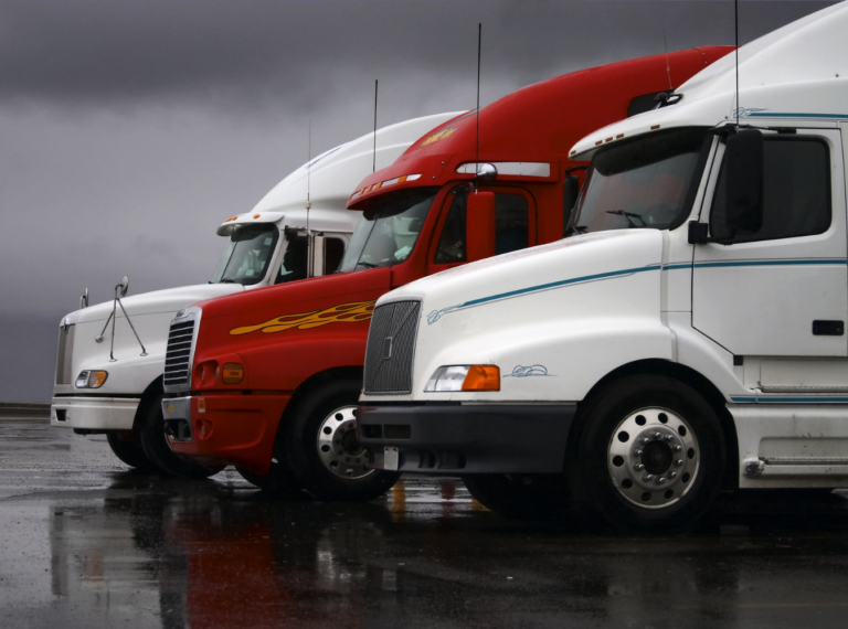 three trucks lined up