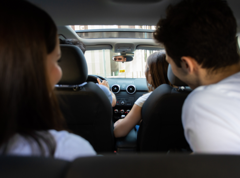 four passengers in a car