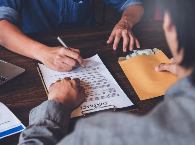 a person signing a contract