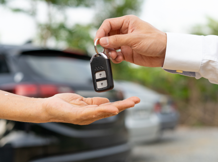 car keys being handed over